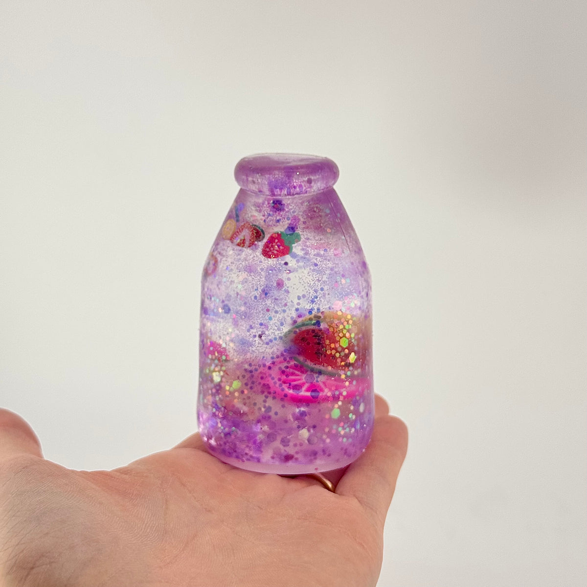 AC SQUISHABLE Glitter Sugar Bottle