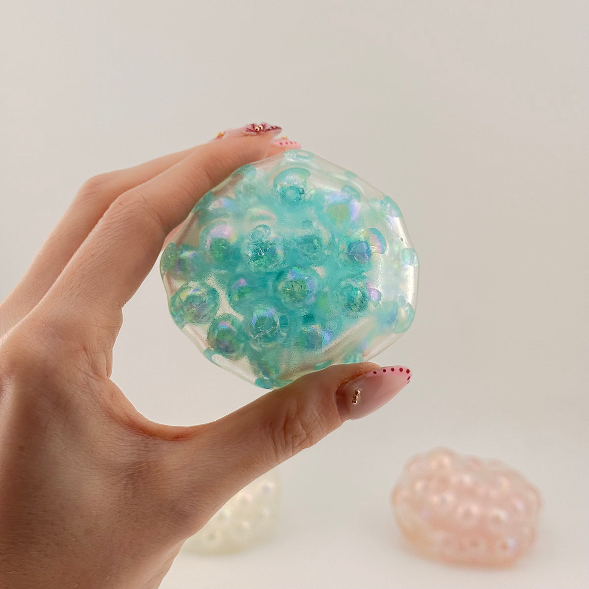 AC SQUISHABLES Pink Blue & White Bead Ball