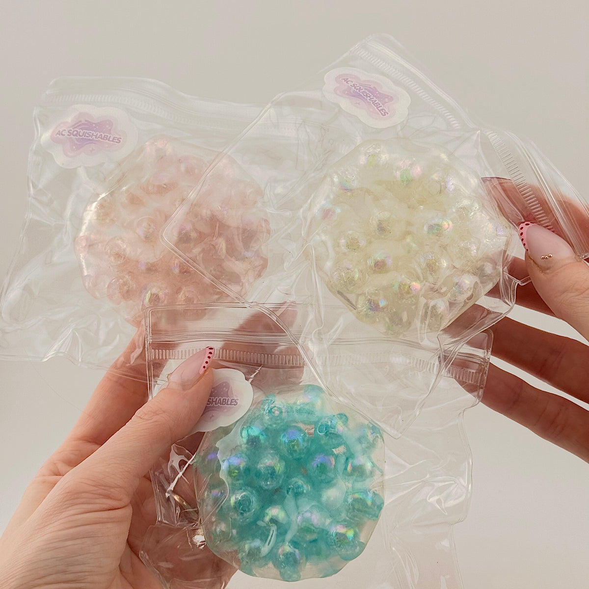 AC SQUISHABLES Pink Blue & White Bead Ball