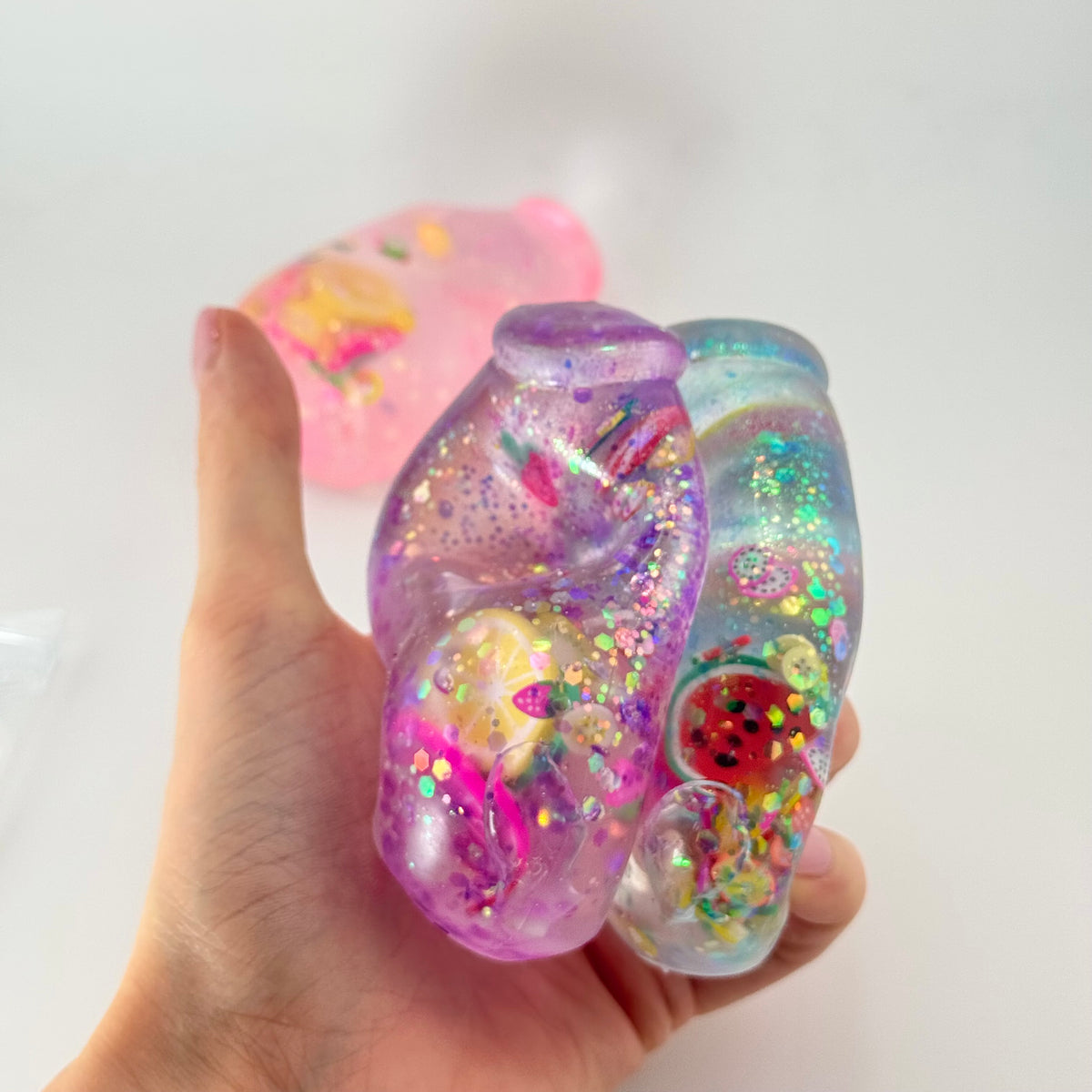 AC SQUISHABLE Glitter Sugar Bottle