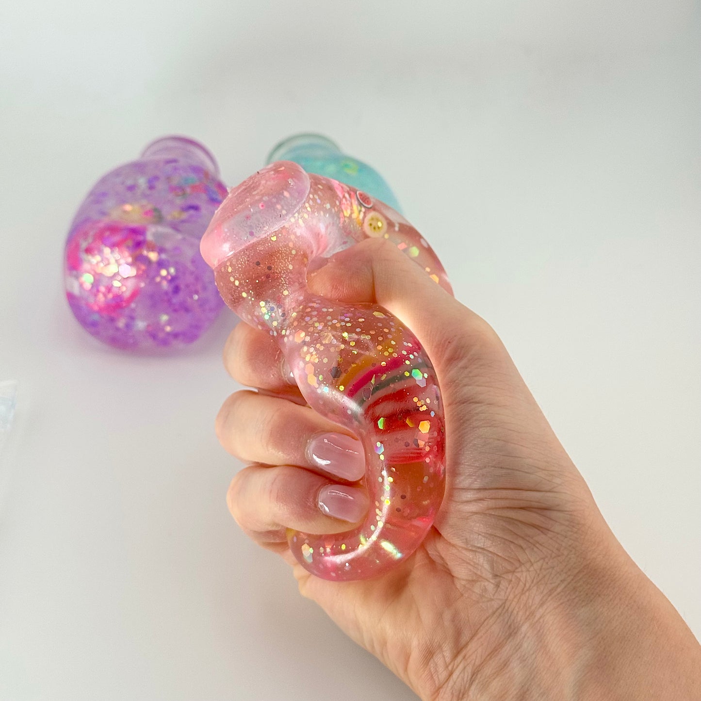 AC SQUISHABLE Glitter Sugar Bottle